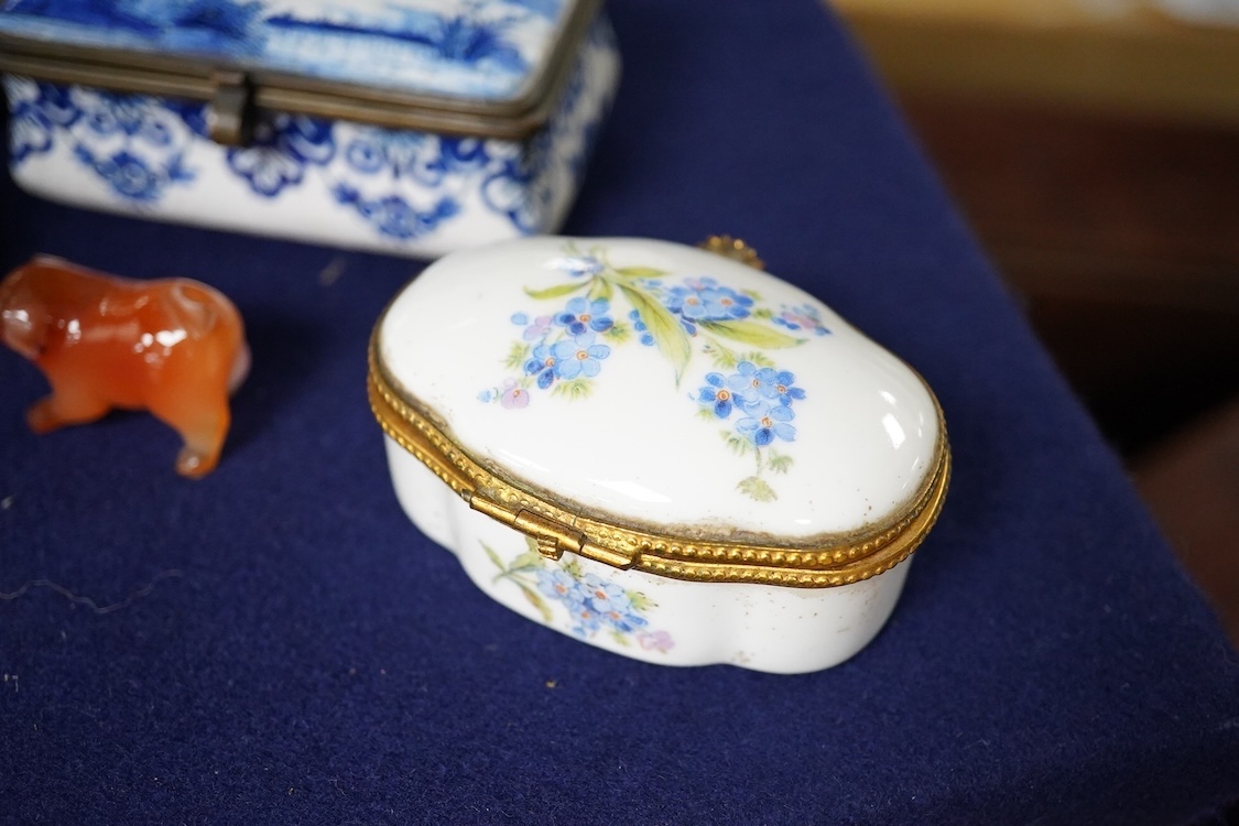 A collection of various 18th century and later trinket/pill boxes, a micro mosaic frame and two small carvings to include a tiger’s eye Scottie dog, frame 10cm in diameter